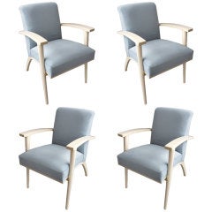 set of four armchairs attributed to Michel Dufet