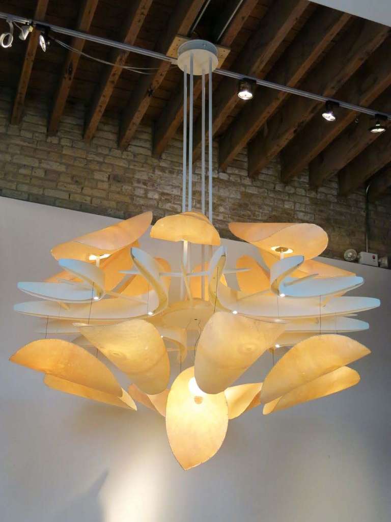 Beautiful chandelier hand made in parchemin and iron.
can be custom size at the client need, in this case there are 2 layers of lights.
made on order
Design by Mauro Fabbro