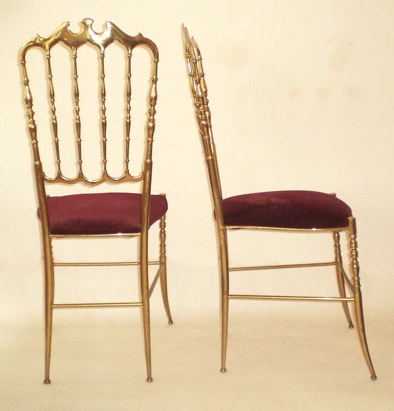 pair of brass and velvet chairs