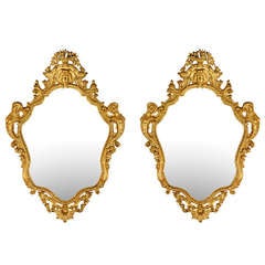 A Pair of French Mid 19th Century Louis XV St. Giltwood Mirrors