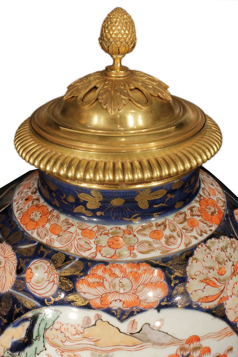 Japanese An Exceptional Pair of French 19th Century Imari Porcelain and Ormolu Lidded Urns