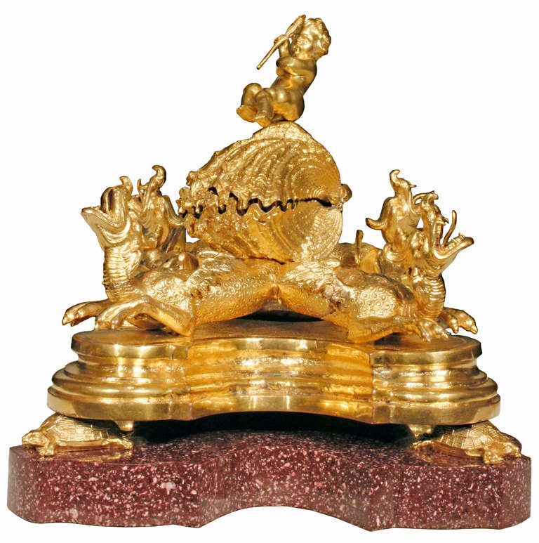 A truly superb and unique French 17th century Louis XIV period ormolu inkwell. This impressive inkwell is raised on a solid scrolled porphyry  base. Four finely chased turtles support the ormolu designed upper portion with a molded edge and scaloped