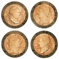 A set of four decorative 19th century Italian marble relief plaques