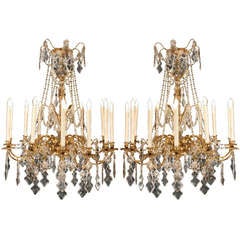 A pair of French 19th century  Louis XVI st. Baccarat twelve arm chandeliers