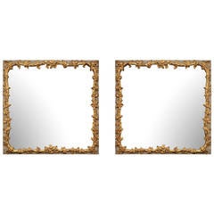 Pair of Italian 19th Century Patinated and Giltwood Mirrors