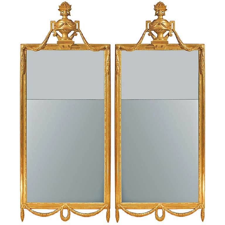 A pair of Italian 19th century Louis XVI st. giltwood mirrors For Sale