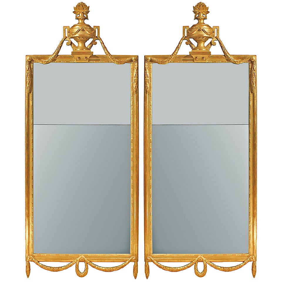 A pair of Italian 19th century Louis XVI st. giltwood mirrors For Sale