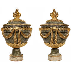 A pair of French 19th century Louis XVI st. solid Verte marble and ormolu urns