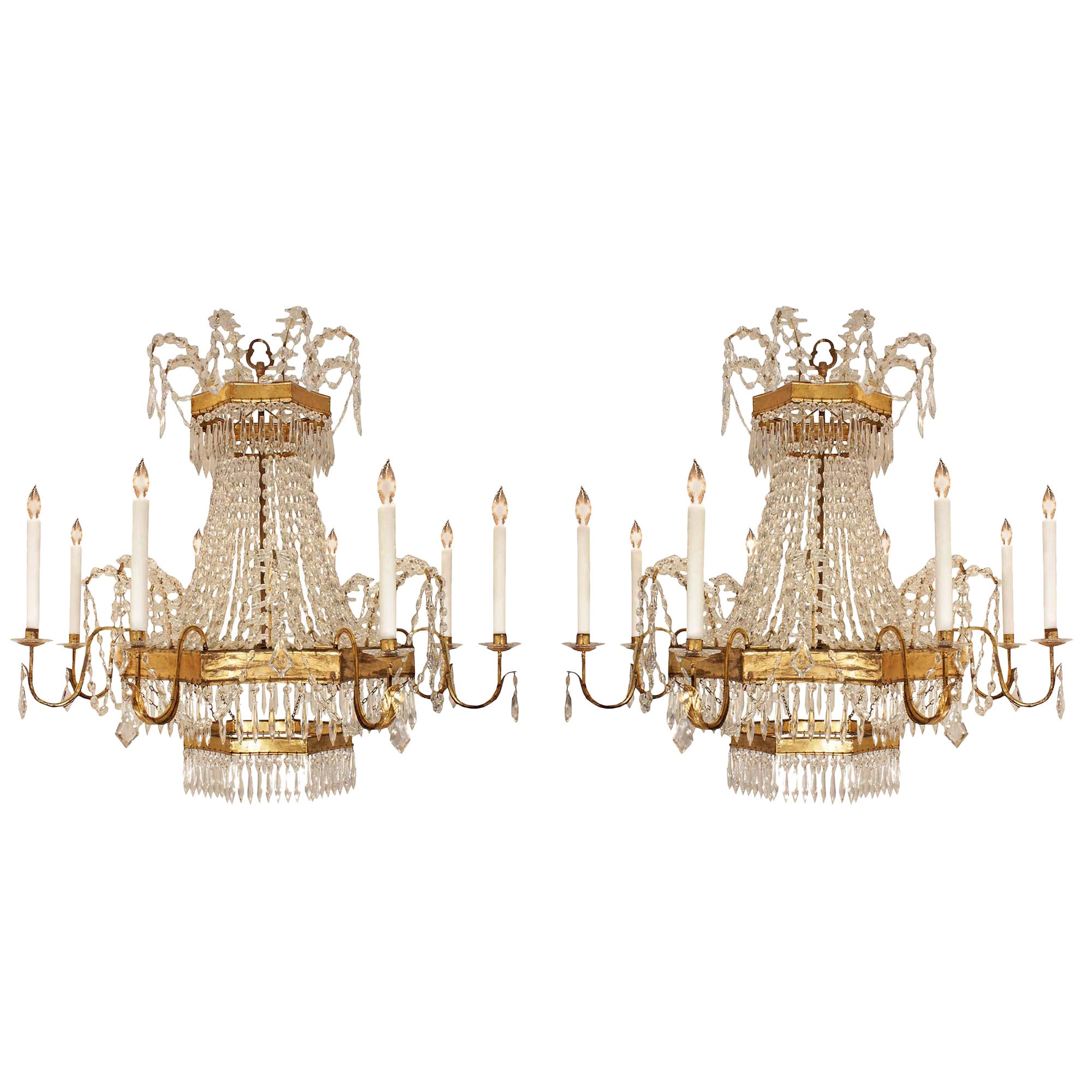 A pair of Italian 19th century gilt metal and crystal eight light chandeliers