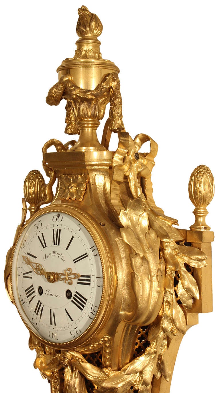 A handsome  and very decorative pair of 19th century French Louis XVI st. ormolu cartel clock and barometer set, signed 'Colin, Paris'. The pair with exquisite rich chasing throughout has all of its original gilding. Both with a bottom berried