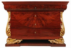 A magnificent mid 19th century Italian Empire st. mahogany and gilt chest