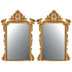 A magnificent pair of Italian 19th century Lombardi giltwood mirrors 12
