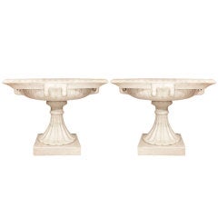 A pair of Italian 19th Century Neo-Classical st. white Carrera marble urns