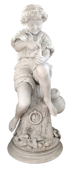 A mid 19th century Italian, solid white Carrara marble signed statue of a young