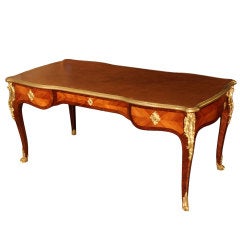 A French Mid 19th Century Louis XV style tulipwood and Kingwood Bureau Plat