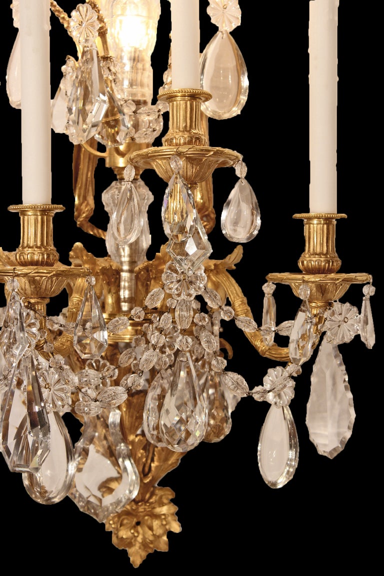 19th Century A pair of French mid 19th century Louis XVI st. ormolu and crystal sconces