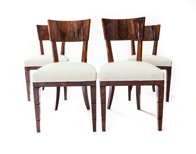 A very rare set of 4 dining chairs designed by Gio Ponti and Emilio Lancia circa 1930.
Available with a Gio Ponti dining table produced for the same forniture
Walnut root and white velvet
Fine and elegant details; polished patina 
Sold with a