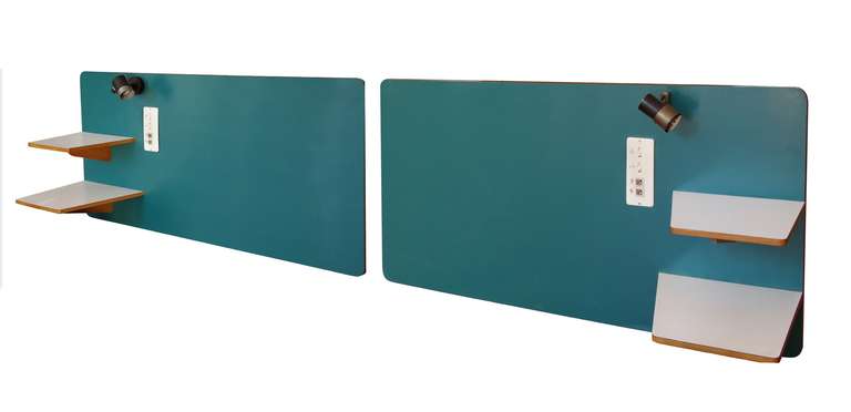A pair of Gio Ponti formica and brushed metal headboards
from the Hotel Parco dei Principi, Roma 1964
with two angular shelves.original lighting unit 
all orginal perfect condition 
formica, ash,metal 
this item came directly form the original