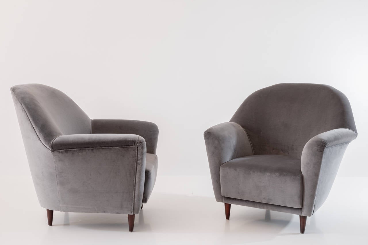 fine and elegant pair of Ico Parisi armchair,1949
probably unique item from a private forniture
produced by Ariberto Colombo, Cantù
measures: h 86cm 90 x 84 cm 
very good condition 
grey velvet upholstery and wood 

expertise by ICO PARISI