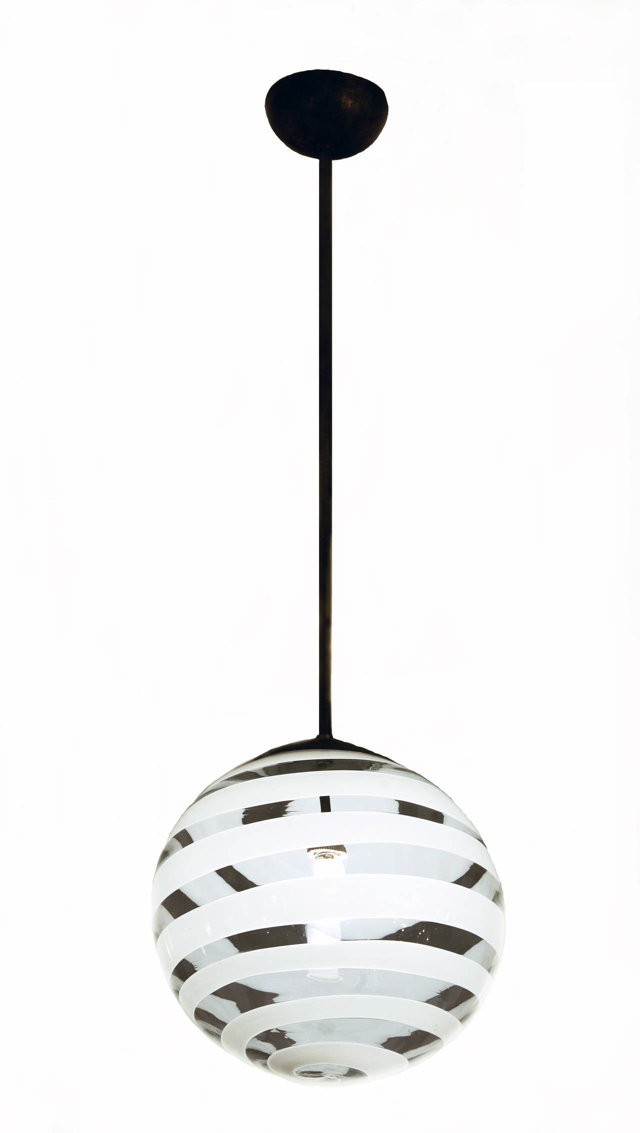 Carlo Scarpa ceiling lamp 1938 

Ceiling lamp designed by Carlo Scarpa and manufactured by Venini Murano 
Clear and Lattimo “ a fasce” glass exhecuted by Venini Murano  
Measures: h 100cm x 32 cm (diam.)
Literature: Anna Venini Diaz De