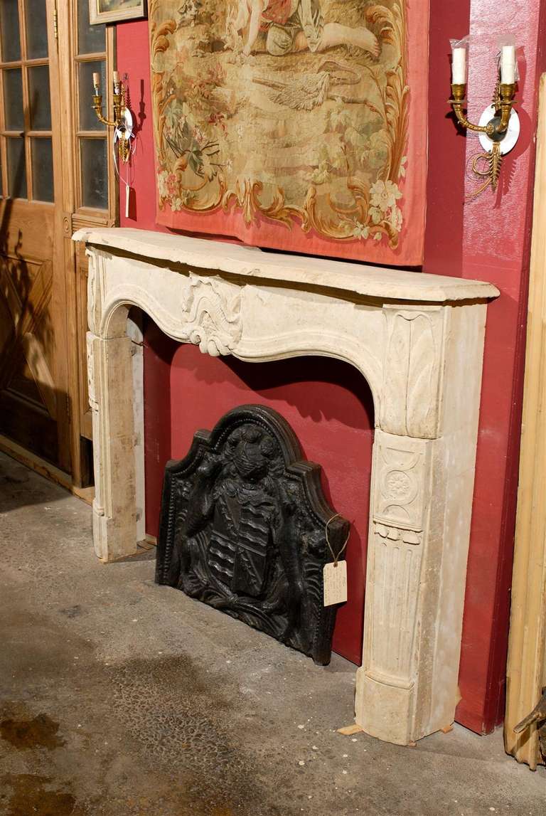 Rare 18th Century French Carved Limestone Mantel with Exceptional Details In Good Condition For Sale In Atlanta, GA