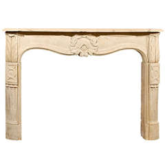Rare 18th Century French Carved Limestone Mantel with Exceptional Details