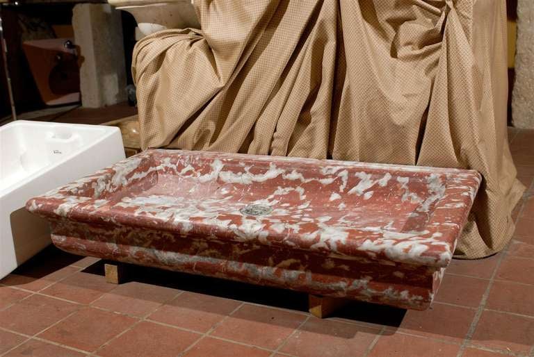 Circa 18th Century French Hand Carved Rouge Royale Marble Washbasin