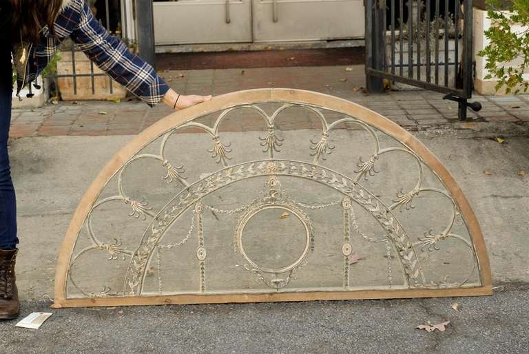 Stunning, early 19th century leaded glass transom in the Georgian style with intricate cast leading details. 

Restored framed. 

For more information, please press contact dealer.