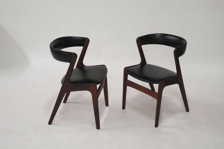 Set of ten walnut curved back dining chairs designed by Kai Kristiansen. O

In original vinyl upholstery. 

Currently sold.

75+ chairs incoming.