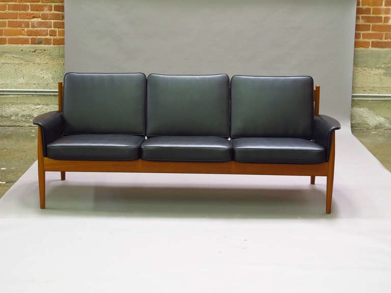 Teak frame sofa designed by Greta Jalk for France & Sons, Denmark in original vinyl covered cushions.