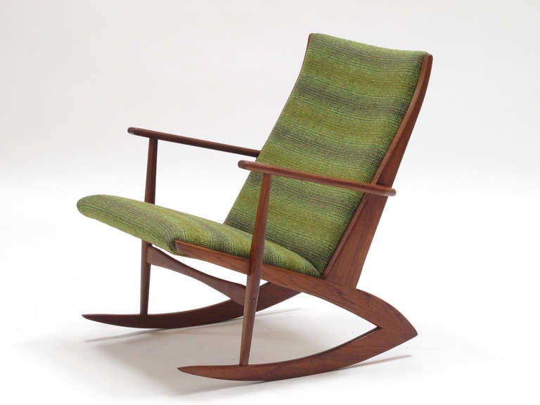 Danish Modern Teak Rocking Chair with boomerang shaped legs designed by Soren Georg Jensen for Kubus. Upholstered in premium Scandinavian wool textile.