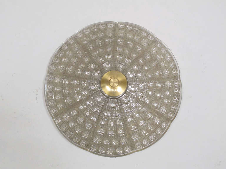 Orrefors of Sweden crystal ceiling lights mounted on brass backplate, designed by Carl Fagerlund. 

Ten available.
 