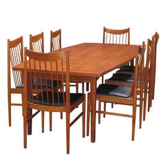 Suite of Eight Arne Vodder Dining Chairs and Table