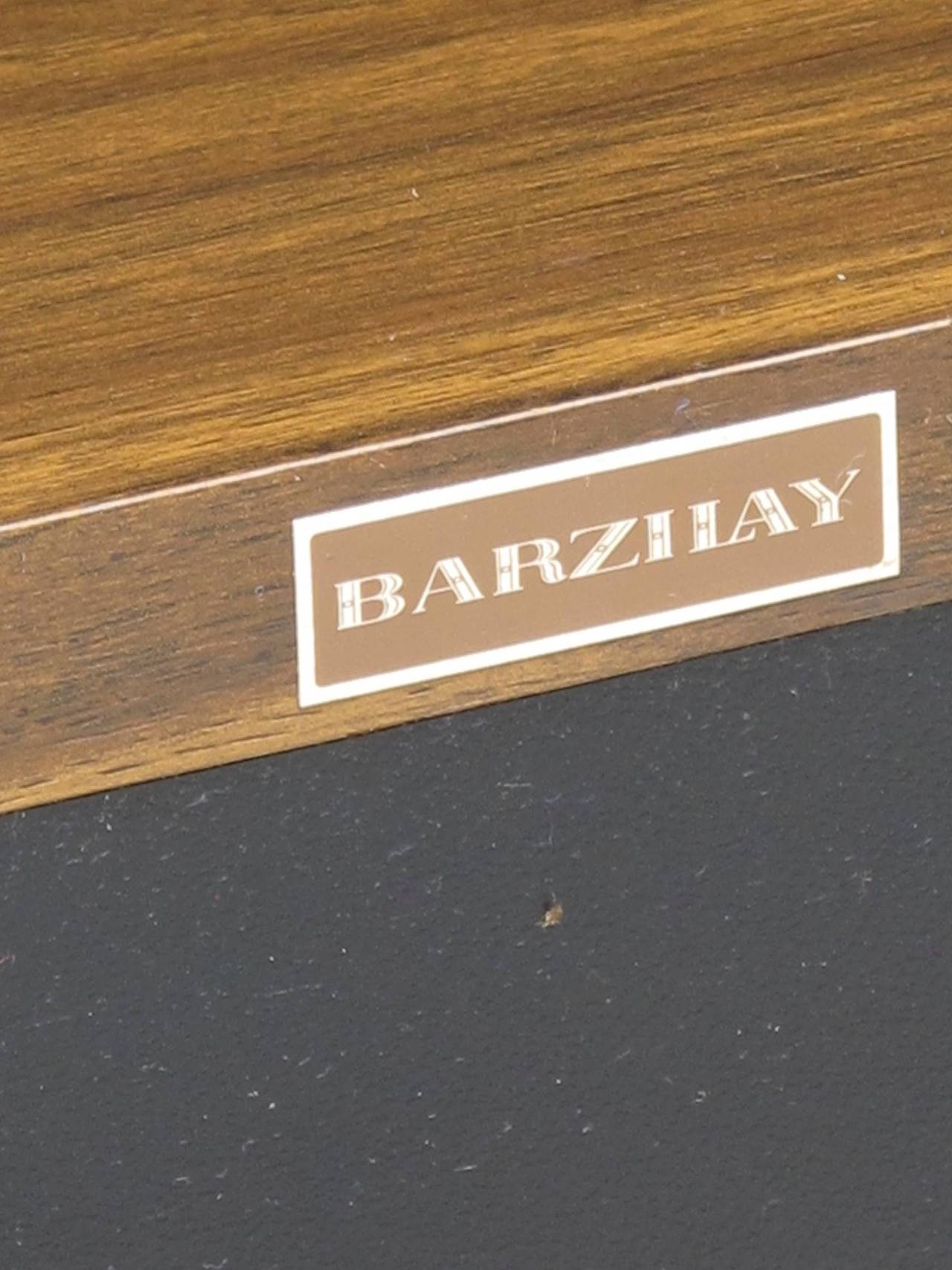 Barzilay walnut cabinet with doors and adjustable interior shelves.