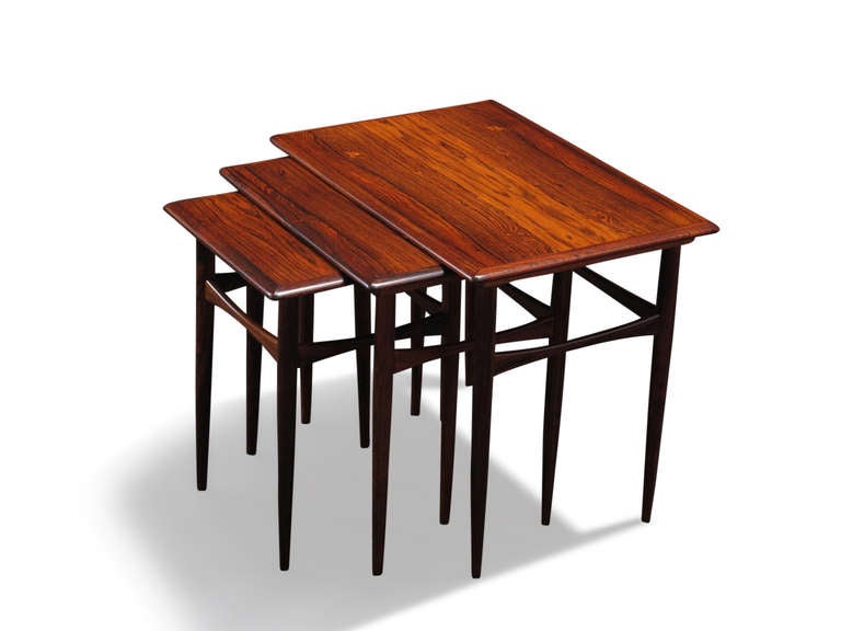 Scandinavian modern nesting tables crafted of Brazilian Rosewood.