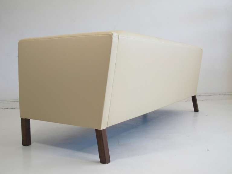 Wood Mid century Danish Leather Sofa by Erik Jorgensen