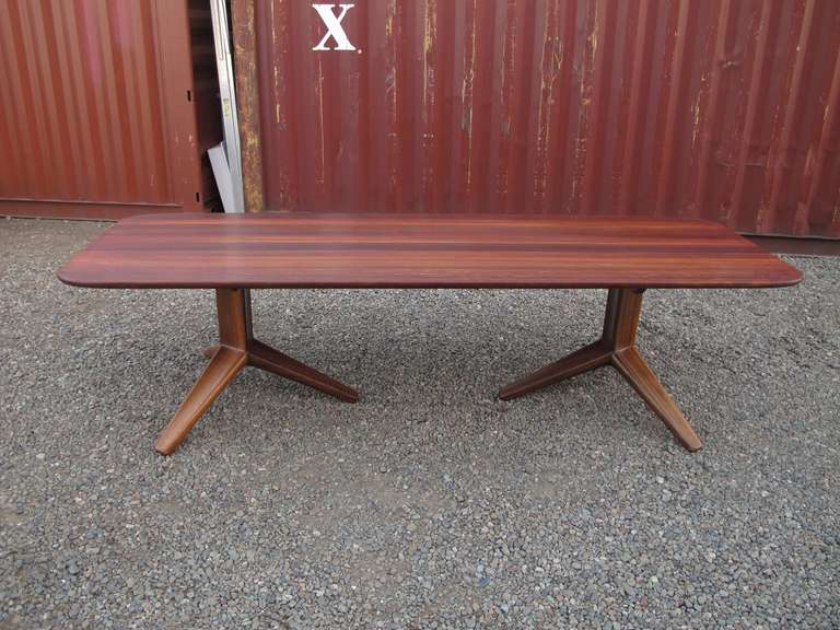 Solid African Padauk pedestal table hand crafted and designed by California craftsman Al Holland Jr. of Sacramento, 1983. Signed.