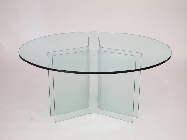 Mid-century Italian all-glass dining table. Base consists of three pieces of curved glass, which supports the 60