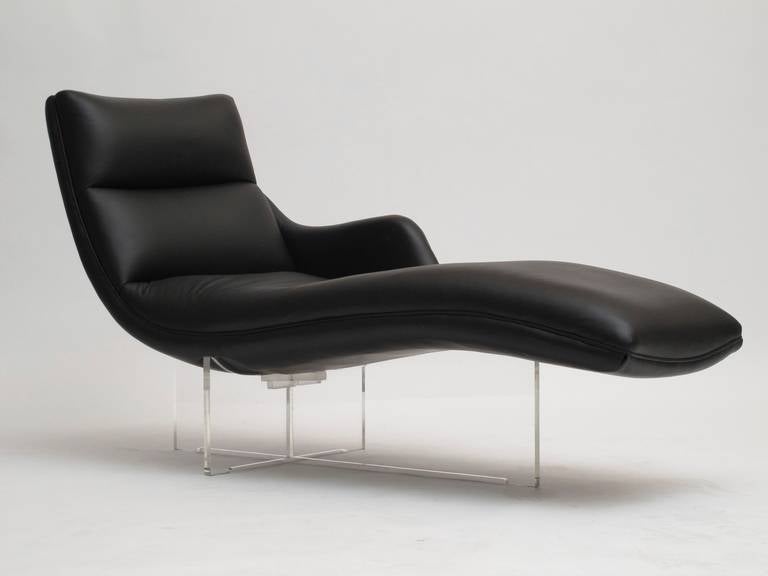 Mid century chase lounge designed by Vladimir Kagan, model P6910. Original leather on lucite base.
