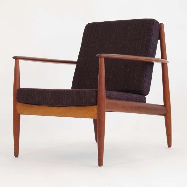 Pair of teak frame lounge chairs designed by Grete Jalk for France and Sons, Denmark. Newly upholstered in Knoll textile. Fabric samples available upon request.
