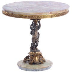 Italian onyx and bronze side table with putti