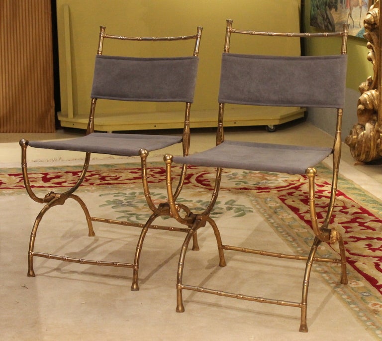 France, 20th century.
Very elegant gilt metal folding chairs with stylized bamboo crossed stretcher, upholstered with lilac velvet. Fine all-over wear commensurate with age and use. We can sell it separately.
Measures: Height 79 cm, width 42 cm,