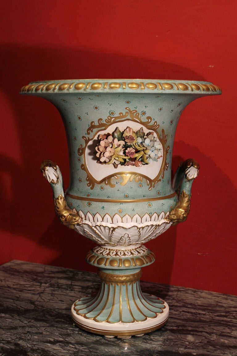 Italy, circa 1930.
A very beautiful Capodimonte antique porcelain vase featuring floral motifs. 