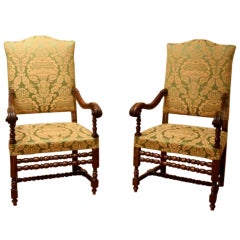 A pair of 19th century Tuscan Neo Renaissance armchairs