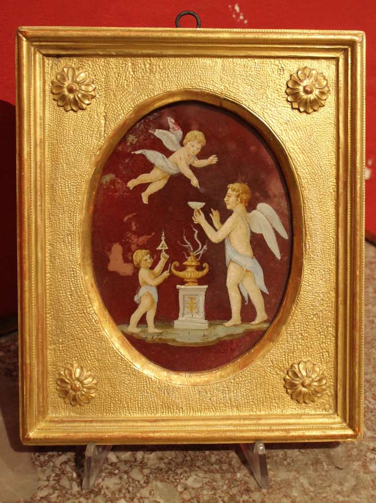 19th Century Italian Neoclassical Style Putti Oil Painting on Oval Glass in Giltwood Frame