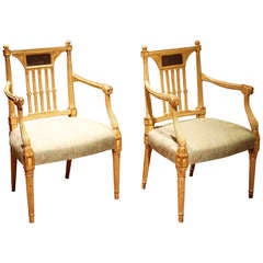 A Pair of Gilt and Lacquered Armchairs by Robert Adam (1728-1792).