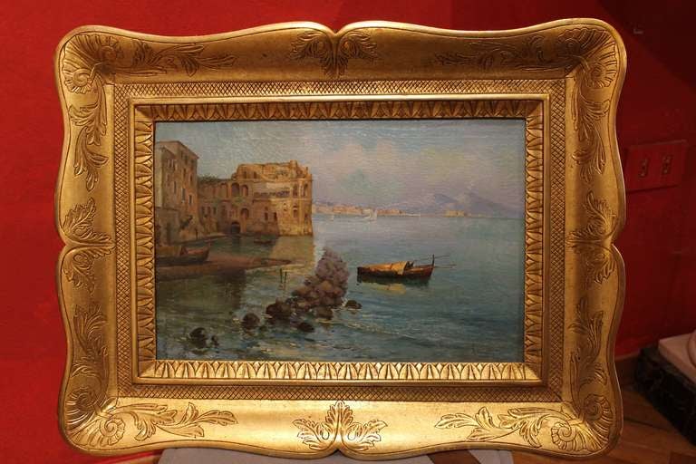 This very fine Impressionist late 19th Century oil on canvas seascape painting depicting a marine landscape with rowing boats and a palace is signed lower right by Oscar Ricciardi (Naples 1864 – 1935), a talented painter who joined the School of