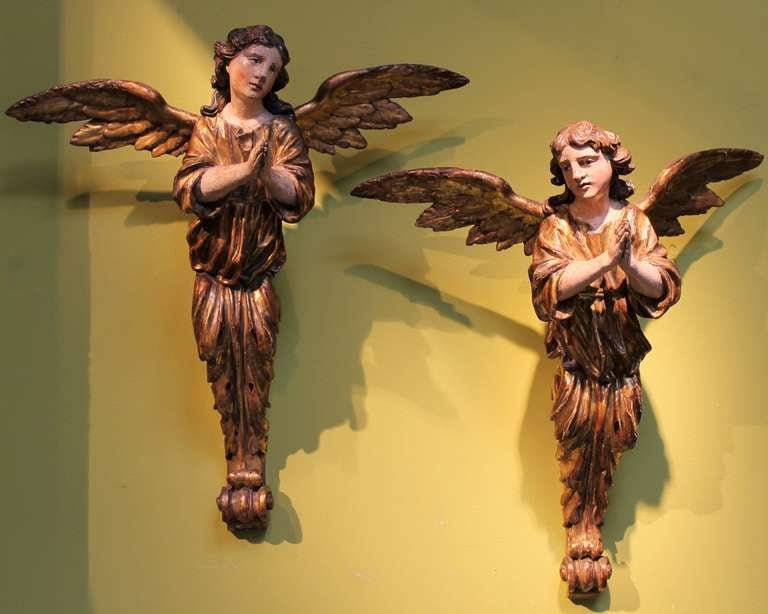 Venice, early 18th century
Exquisite carved and lacquered wood pair of angel figures. These sculptures were created as decorative elements for an altar placed in a private chapel of a noble palace in Venice. The angels, represented while praying