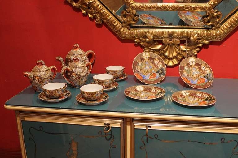 Consisting of everything you need to serve tea or coffee. This beautifully hand-painted fine porcelain tea/coffee service with its decorations and its gold leaf accents will add a splash of color to your entertaining with its exotic decoration. This