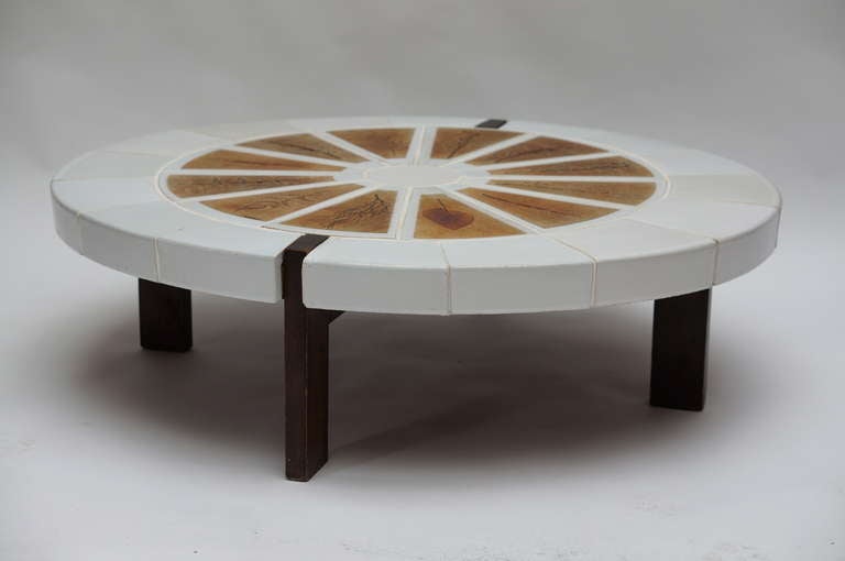 A circa 1970 Roger Capron coffee table.
The wood top made with gres ceramic tiles from the 